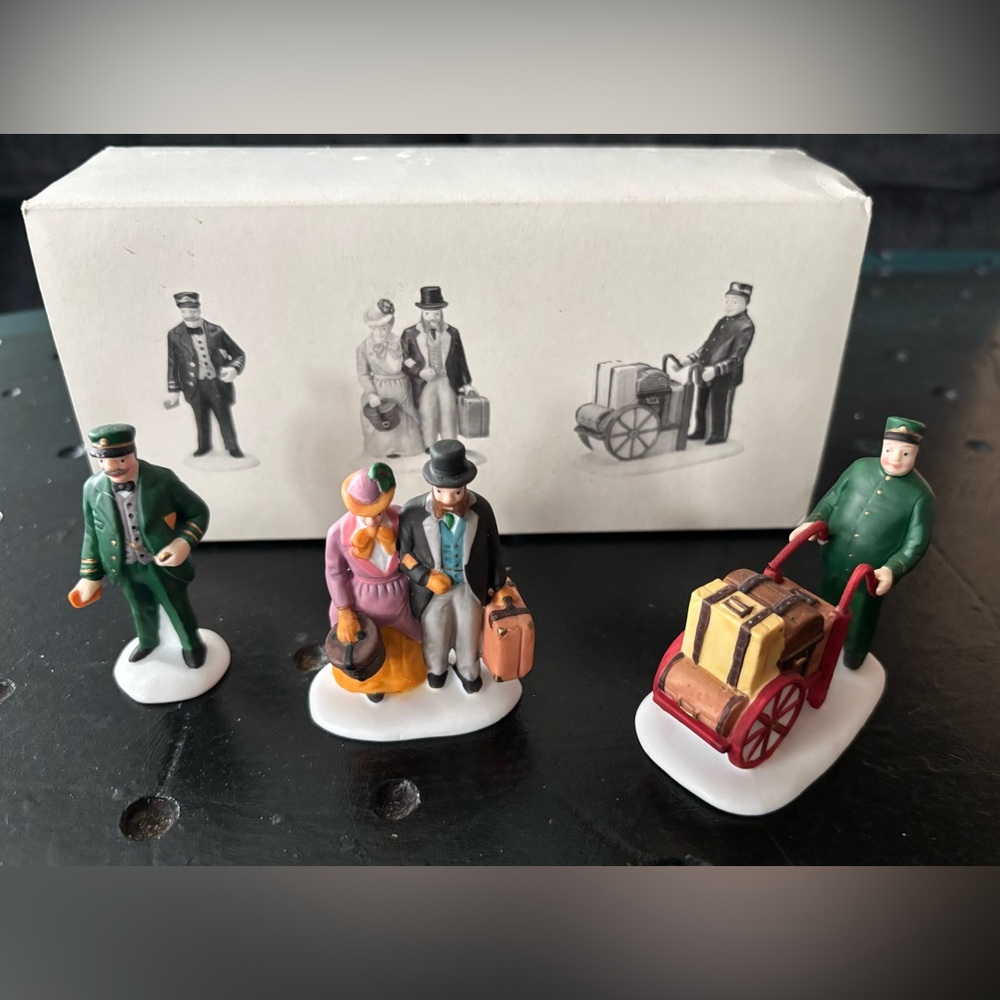 Department 56 Heritage Village Collection “Holiday Travelers”